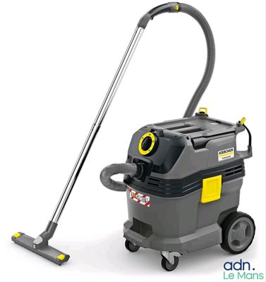 a grey and yellow vacuum cleaner with a hose on a white background