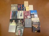 a lot of books that are on the table