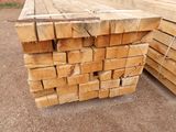 several pieces of wood stacked on top of each other in a pile