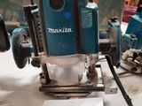a blue machine that is sitting on a table