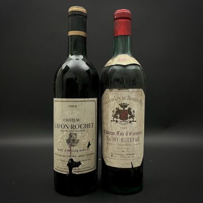 deux bouteilles de vin posées l'une à côté de l'autre sur une table