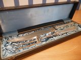 a knife and fork in a case on a table