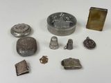 a lot of silver items that are on a table
