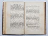 an open book with a picture of a man on it