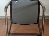 a chair that is sitting on the floor in the room