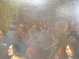 une peinture représentant un groupe de personnes assises autour d'une table