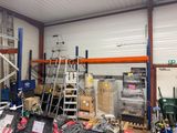 a room with a lot of boxes and tools in it