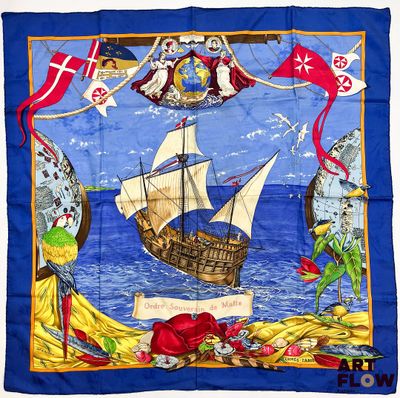 une image représentant une écharpe bleue sur laquelle figure un bateau pirate