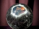 an image of a crystal ball on a stand