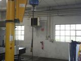 a picture of a large industrial building with a crane in the middle of the room
