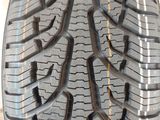 an image of a close up of a tire on a white surface