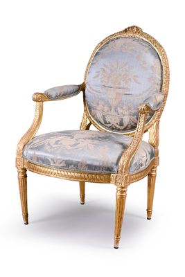 an image of a chair with a blue upholstered seat and gold trim