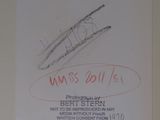 signed autograph of a man ' s name and signature on a white paper