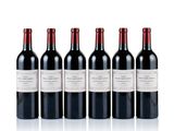 six bottles of red wine lined up in a row