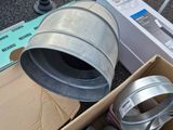 a box full of tins and cans sitting on the ground