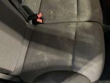 a seat in the back of a car that is empty