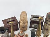 many different types of vases on the table