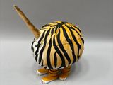 a small animal figurine that is sitting on a table