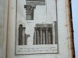 an old book with a drawing of columns and columns on it