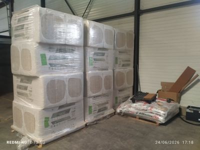 many boxes of air conditioners stacked on top of each other
