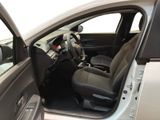the interior of a car with the door open and the driver ' s seat down