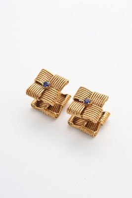 paire de boutons de manchette dorés sertis de saphirs