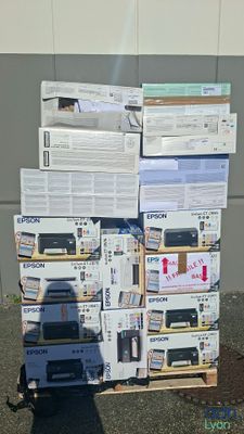 boxes stacked on top of each other in front of a building
