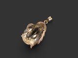 un pendentif en or jaune orné d'une grande citrine facettée