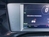 the dashboard of a car with a digital display on it ' s dashboard