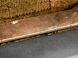 a close up of a piece of wood on the floor