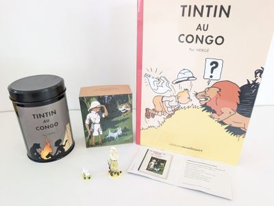 une boîte de Tintin devant un livre et un bidon de Tintin