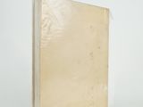 an open book with a white cover and a white background