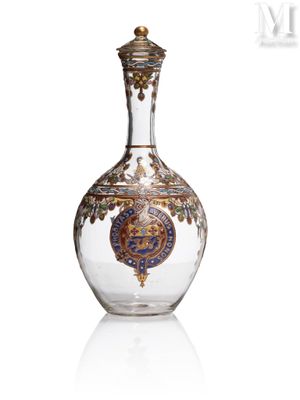an image of a glass bottle with a gold and blue design