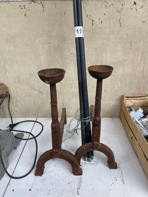 two candles that are sitting on a table