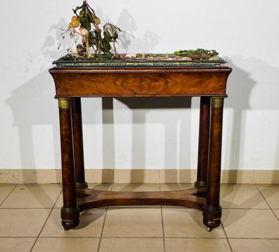 an image of a small table with a plant on top of it