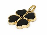 a gold and black clover charm with four leaves