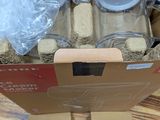 a cardboard box with a bunch of items inside of it