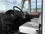 a black and white photo of the inside of a van