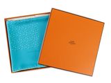 an orange and blue gift box with a blue cover