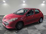 a picture of a red car parked in a garage