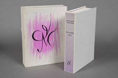 an image of a white book with a pink cover and a black and white logo on it