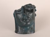 an image of a sculpture of a man ' s head on a white background
