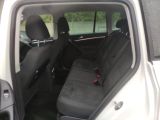 a car that has two seats in the back of it