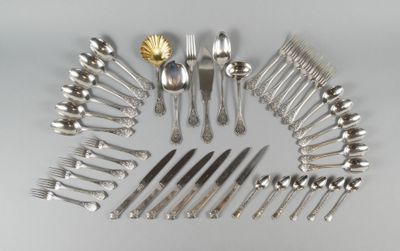 many different types of silverware arranged in a circle