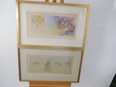two framed pictures of birds on a easel next to each other