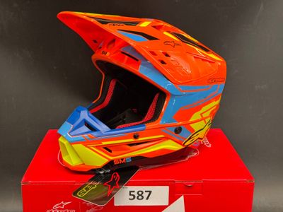 an image of a helmet on top of a red box