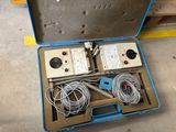a box with wires and wires in it on the floor