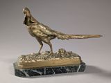 statue of a pheasant on a marble base on a white background