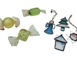 a group of glass ornaments on a white surface