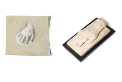 an image of a stamp with a hand on it next to a piece of paper